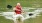 a man kayaking in a lake